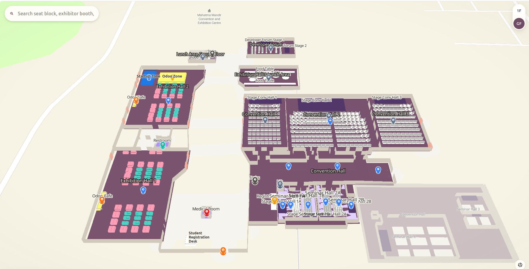 The Mapnyx navigator rendering a whole exhibition campus in 3D — extruded exhibition halls with individual booths, convention halls with seating, a seminar block and labelled amenities, with a floor switcher at the top right.