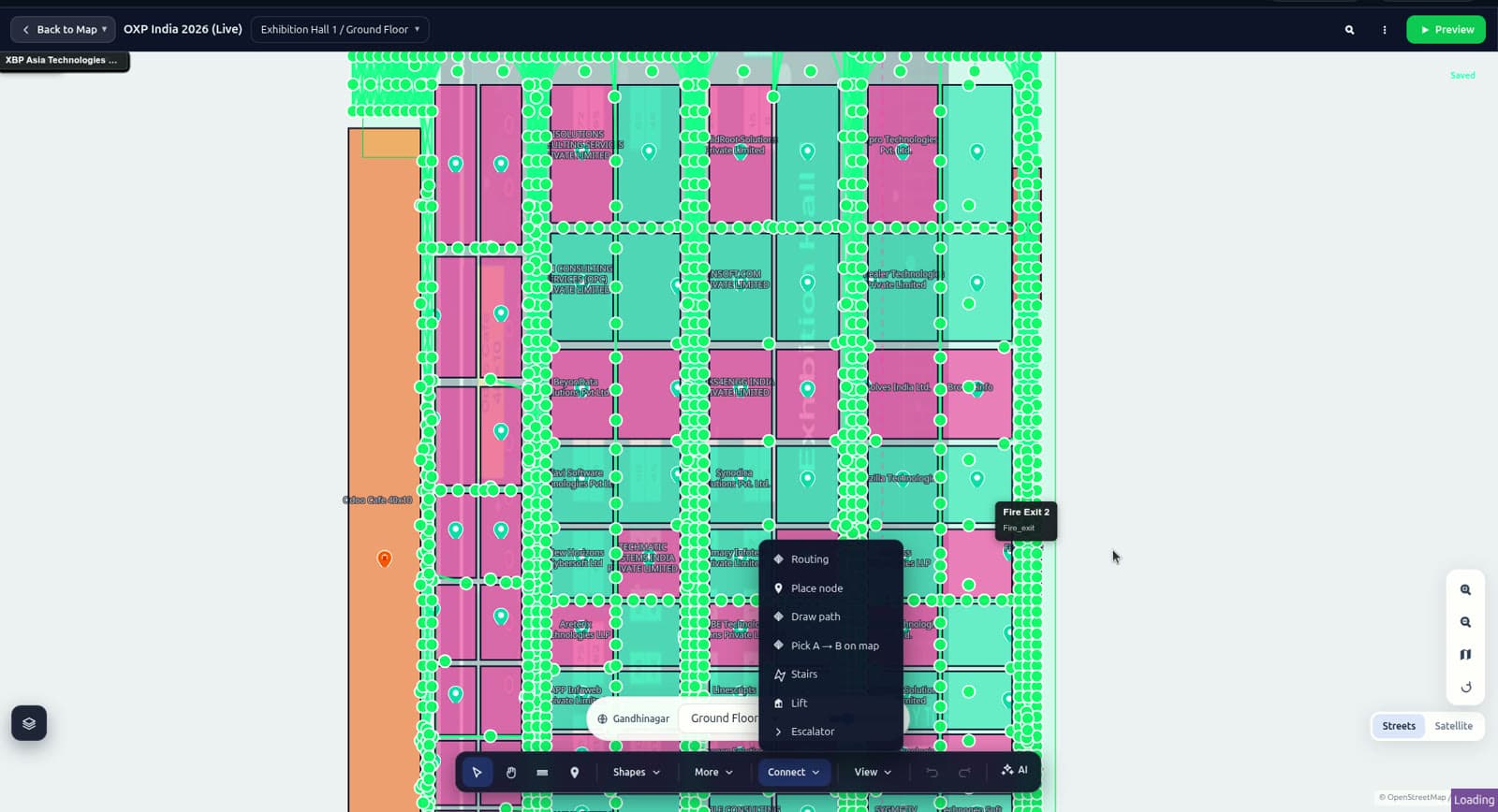 Mapnyx Studio editor with booth polygons, the routing graph, and a connector menu for stairs, lifts and escalators.